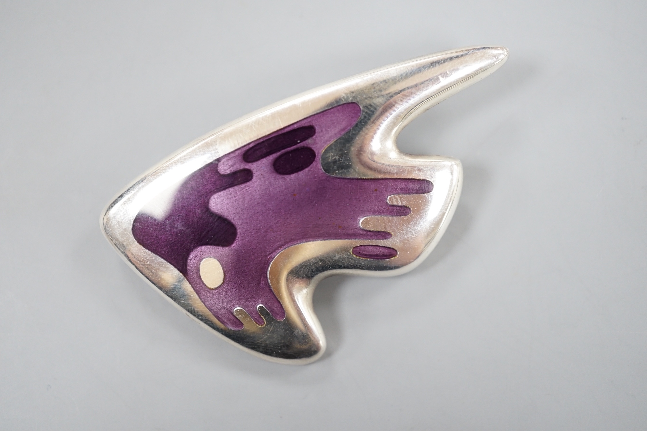 A Henning Koppel for Georg Jensen sterling and enamel stylised fish brooch, no. 307, 57mm.